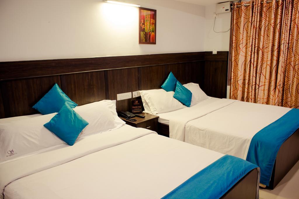 The Signature Inn Bangalore Værelse billede