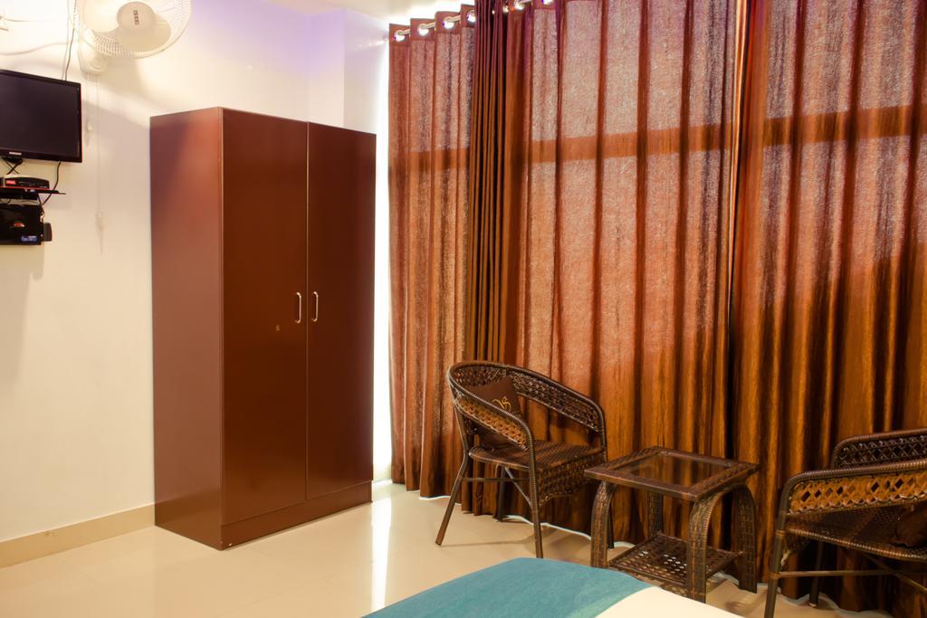 The Signature Inn Bangalore Værelse billede